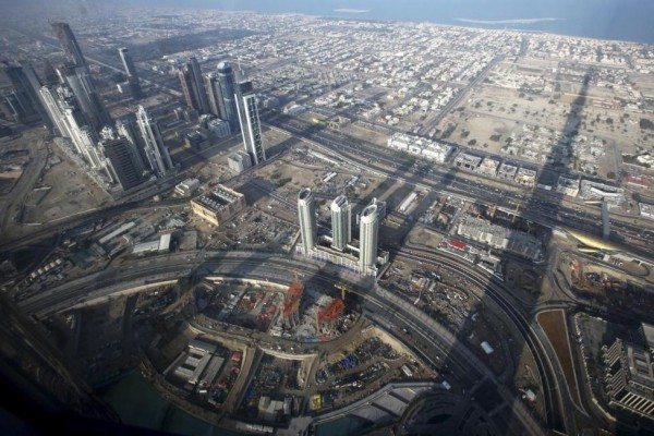 The view from the observation deck located on the 124th floor of the Burj Dubai Tower shows a shadow cast by the Tower on the city of Dubai below, January 4, 2010.  REUTERS/Ahmed Jadallah