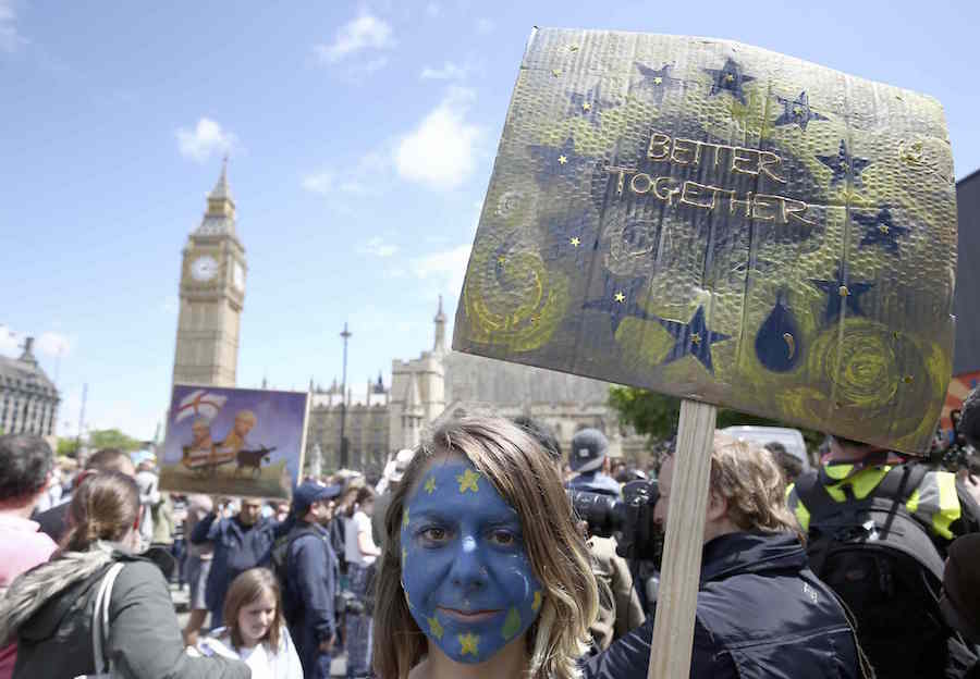 Protestors hold banners in Parliament Square during a 'March for Europe' demonstration against Britain's decision to leave the European Union, central London, Britain July 2, 2016. Britain voted to leave the European Union in the EU Brexit referendum. REUTERS/Neil Hall