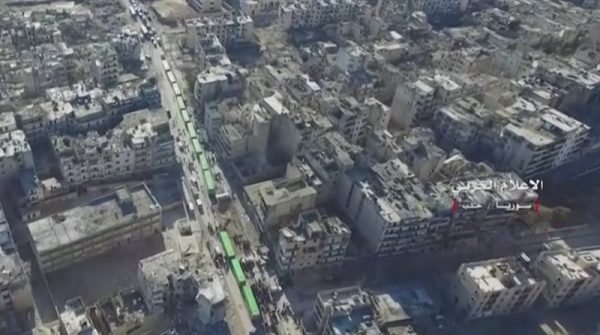 A still image from video taken December 15, 2016 over eastern Aleppo shows an operation to evacuate thousands of civilians and fighters in buses from Aleppo, Syria. Syrian Army/Handout via Reuters TV