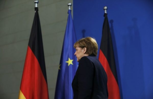 German Chancellor Angela Merkel leaves a news conference in Berlin, Germany, December 20, 2016, one day after a truck ploughed into a crowded Christmas market in the German capital. REUTERS/Hannibal Hanschke