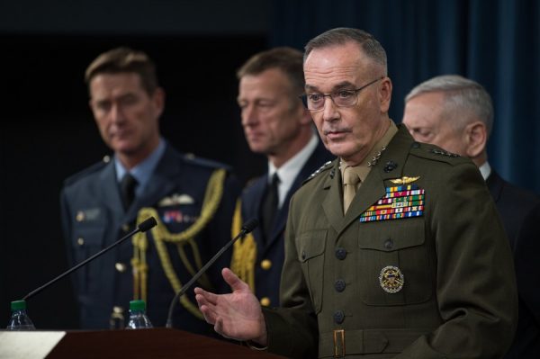 epa06667844 A handout photo made available by the Office of the US Secretary of Defense shows Chairman of the Joint Chiefs of Staff, Marine Gen. Joseph F. Dunford, Jr. (2-R), and US Defense Secretary James N. Mattis (R, back) briefing reporters on the current US air strikes on Syria during a joint press conference at the Pentagon in Washington, DC, USA, 13 April 2018. The militaries of the US, Britain and France launched airstrikes targeting three sites allegedly related to the Syrian government's chemical weapon capabilities. The strikes come in the wake of an alleged chemical weapons attack in Douma on 07 April. EPA/SGT. AMBER SMITH / HANDOUT HANDOUT EDITORIAL USE ONLY/NO SALES