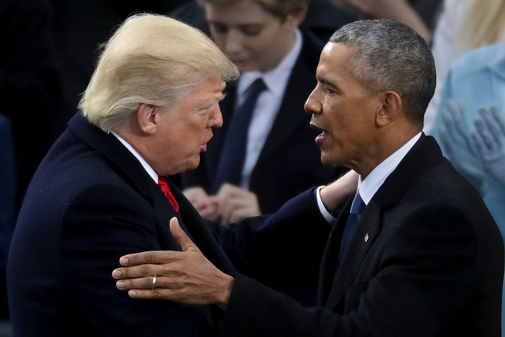 WASHINGTON, DC - JANUARY 20: Former U.S. President Barack Obama (R) congratulates U.S. President Donald Trump after he took the oath of office on the West Front of the U.S. Capitol on January 20, 2017 in Washington, DC. In today's inauguration ceremony Donald J. Trump becomes the 45th president of the United States. (Photo by Chip Somodevilla/Getty Images)