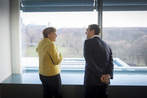 Prime Minister Alexis Tsipras talk at the start of their meeting at the Chancellery on March 23, 2015 in in Berlin, Germany.  (Photo by Guido Bergmann-Bundesregierung via Getty Images)