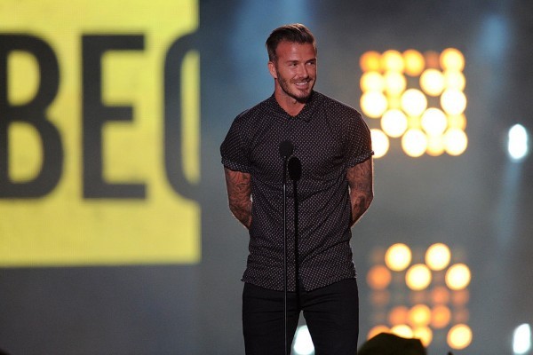 LOS ANGELES, CA - JULY 17:  Soccer player David Beckham accepts the Legend Award onstage during Nickelodeon Kids' Choice Sports Awards 2014 at UCLA's Pauley Pavilion on July 17, 2014 in Los Angeles, California.  (Photo by Kevin Winter/Getty Images)