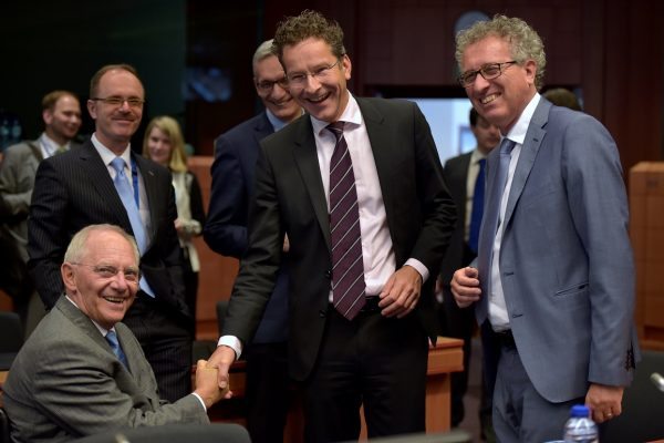 Germany's Finance Minister Schauble chats with Eurogroup President Dijsselbloem and Luxembourg's Finance Minister Gramegna during a Euro zone finance ministers meeting in Brussels
