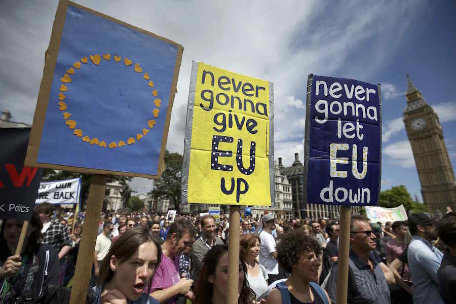 Protestors hold banners in Parliament Square during a 'March for Europe' demonstration against Britain's decision to leave the European Union, central London, Britain July 2, 2016. Britain voted to leave the European Union in the EU Brexit referendum. REUTERS/Neil Hall