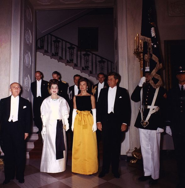 386620 20: President John F. Kennedy and Jacqueline Kennedy, right, pose for a photograph with guests before a dinner in honor of the President of Peru, left, at the White House September 19, 1961 in Washington, DC. (Photo courtesy of Kennedy Library Archives/Newsmakers)