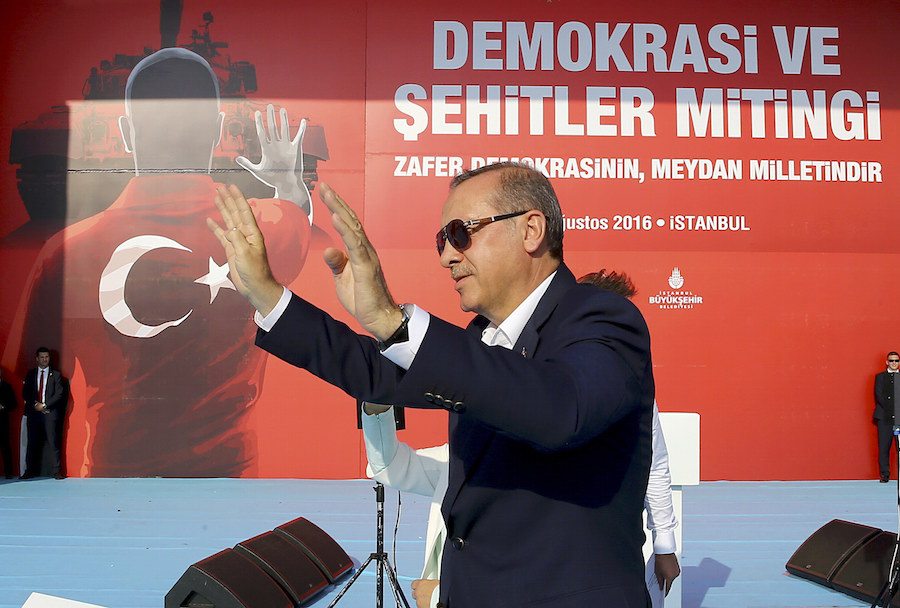 Turkey's President Erdogan greets people during the Democracy and Martyrs Rally in Istanbul