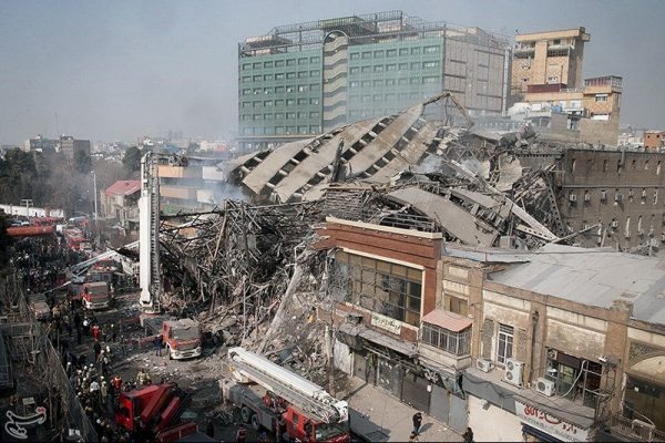 A collapsed building is seen in Tehran, Iran January 19, 2017. Tasnim News Agency/Handout via REUTERS ATTENTION EDITORS - THIS PICTURE WAS PROVIDED BY A THIRD PARTY. FOR EDITORIAL USE ONLY. NO RESALES. NO ARCHIVE. THIS PICTURE WAS PROCESSED BY REUTERS TO ENHANCE QUALITY. AN UNPROCESSED VERSION HAS BEEN PROVIDED SEPARATELY. TPX IMAGES OF THE DAY