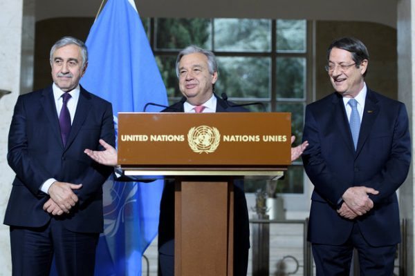 UN Secretary-General Antonio Guterres (C) speaks next to Greek Cypriot President Nicos Anastasiades (R) and Turkish Cypriot leader Mustafa Akinci during a press conference after the Conference on Cyprus, on the sidelines of the Cyprus Peace Talks, at the European headquarters of the United Nations in Geneva, Switzerland, January 12, 2017. REUTERS/Laurent Gillieron/Pool