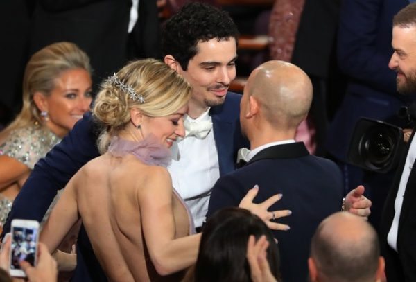 89th Academy Awards - Oscars Awards Show - Damien Chazelle is congratulated for winning Best Director. REUTERS/Lucy Nicholson