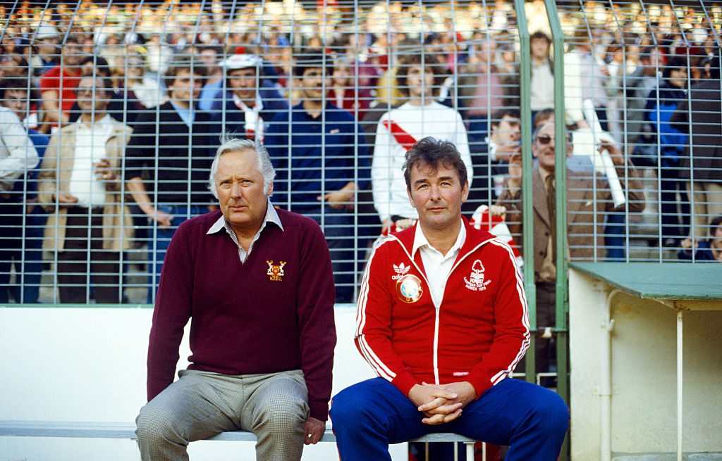 MADRID, SPAIN - MAY 28: Nottingham Forest manager Brian Clough (R) and assistant Peter Taylor look on before the 1980 European Cup Final between Hamburg SV and Nottingham Forest at Santiago Bernabau Stadium on May 28, 1980 in Madrid, Spain, The 1980 European Cup was the last trophy that Clough and Taylor would win as a partnership. (Photo by Duncan Raban/Allsport/Getty Images).