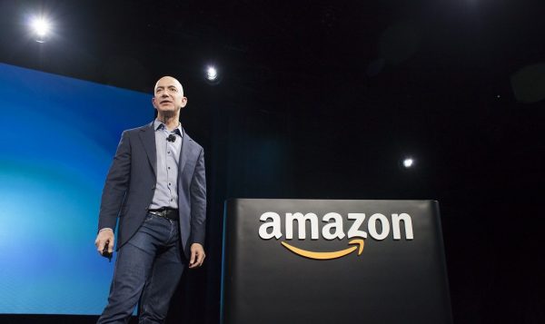 SEATTLE, WA - JUNE 18: Amazon.com founder and CEO Jeff Bezos presents the company's first smartphone, the Fire Phone, on June 18, 2014 in Seattle, Washington. The much-anticipated device is available for pre-order today and is available exclusively with AT&T service. (Photo by David Ryder/Getty Images)