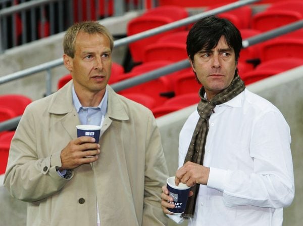 LONDON - AUGUST 22: Juergen Klinsmann, ex-manager of Germany (L) and Joachim Low, current manager of Germany, talk prior during the international friendly match between England and Germany at Wembley stadium on August 22, 2007 in London, England. (Photo by Martin Rose/Bongarts/Getty Images)