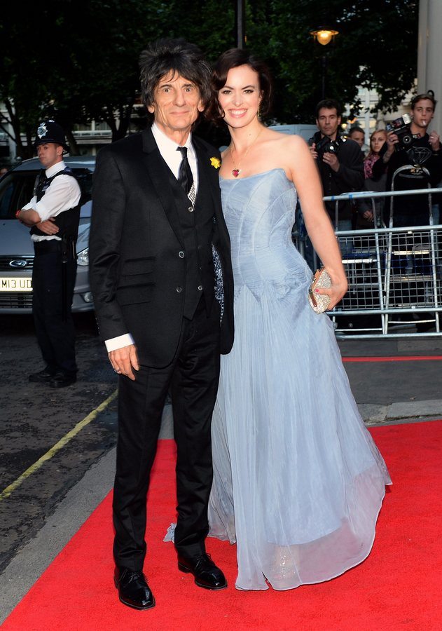 epa03864859 British musician Ronnie Wood of the Rolling Stones and his wife Sally Humphreys arrives at the inaugural Tusk Conservation Awards in central London, Britain, 12 September 2013. EPA/ANDY RAIN