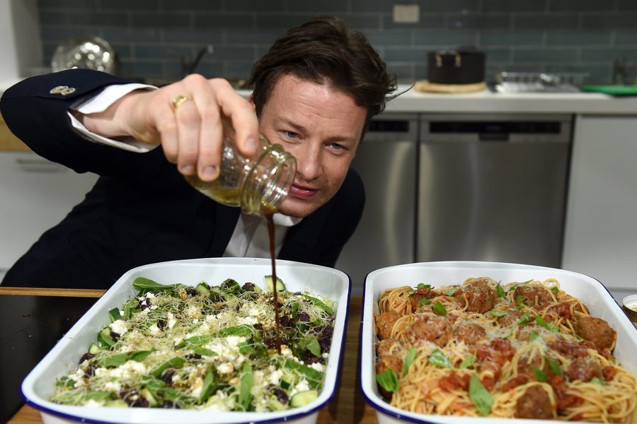 epa05615463 (FILE) A file photograph showing British Celebrity chef Jamie Oliver helping out at Jamie's Ministry of Food in Sydney Australia, 30 March 2015. Media reports on 03 November 2016 state that receivers for the Keystone Group have announced the Jamie Oliver Group as the preferred Bidder for the Keystone Group’s Australian Jamie’s Italian restaurant franchise chain. Receiver Morgan Kelly said it was an ideal outcome for the Australian Jamie’s Italian franchises to return to parent group ownership and operation. Jamie Oliver said, the Australian franchise, some of the best performing Jamie’s Italian restaurants worldwide, were put up for sale when the franchise partner, Keystone Group went into receivership over the summer. This was in no way a reflection on the performance or success of the restaurants. EPA/PAUL MILLER AUSTRALIA AND NEW ZEALAND OUT