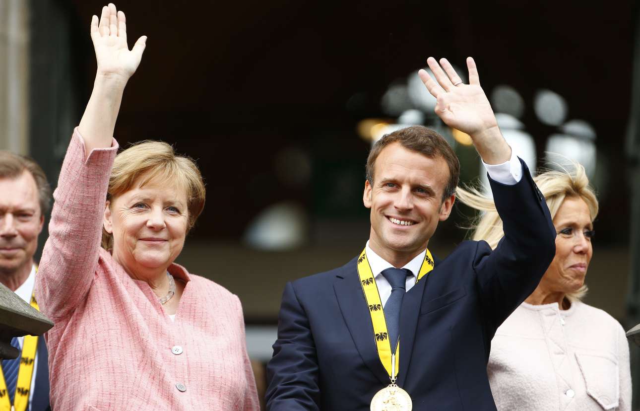 Ο Μακρόν πήρε το «Καρλομάγνος» και ζήτησε από τη Μέρκελ να μην έχει φετίχ με τα πλεονάσματα