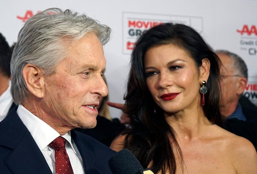epa05150639 British actress Catherine Zeta-Jones (R) and her husband US actor Michael Douglas arrive for the AARP's 15th Annual Movies For Grownups Awards at the Beverly Wilshire Four Seasons Hotel in Beverly Hills, California, USA, 08 February 2016. EPA/NINA PROMMER