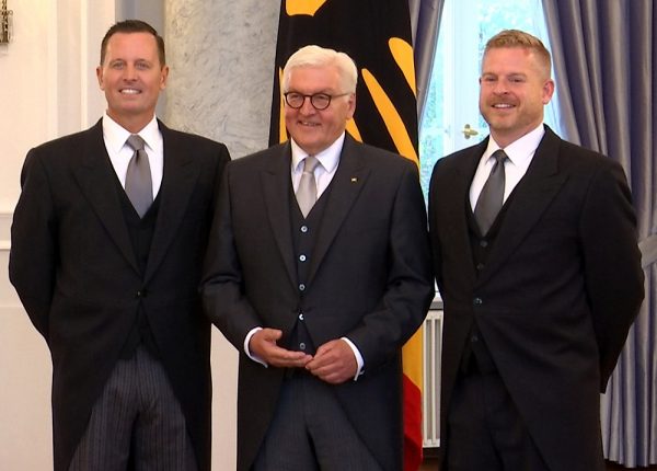 New U.S. ambassador to Germany Richard Allen Grenell (L) and his partner Matthew Lashey pose with German President Frank-Walter Steinmeier after his diplomatic accreditation at Bellevue Palace in Berlin, Germany, in a still image taken from a Reuters TV footage on June 4, 2018. REUTERS/Reuters TV