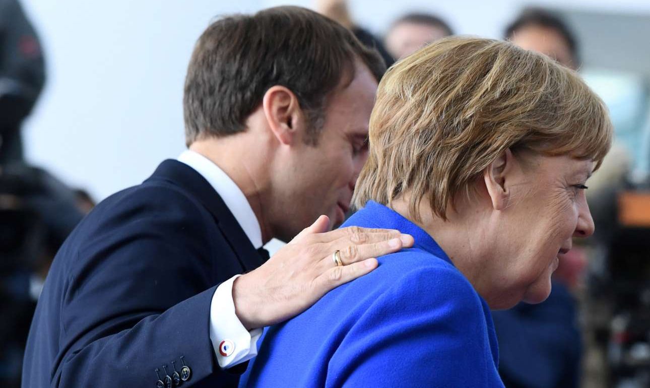 Σύγκρουση κορυφής Μακρόν-Μέρκελ για τον πρόεδρο της Κομισιόν